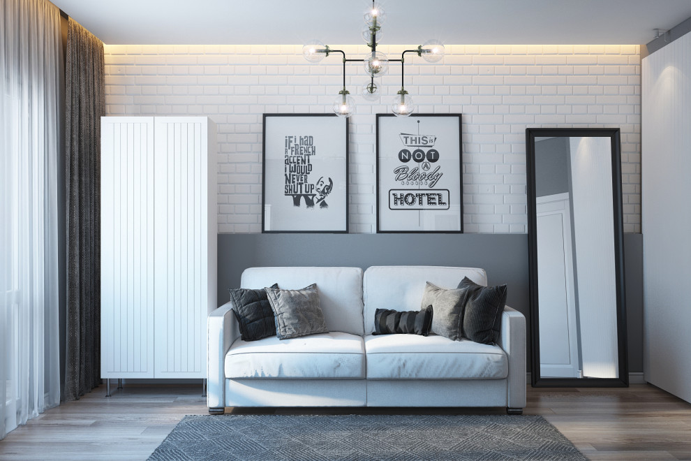 Источник вдохновения для домашнего уюта: двухуровневая гостиная комната в скандинавском стиле с серыми стенами, полом из ламината, телевизором на стене, бежевым полом, кессонным потолком и панелями на части стены
