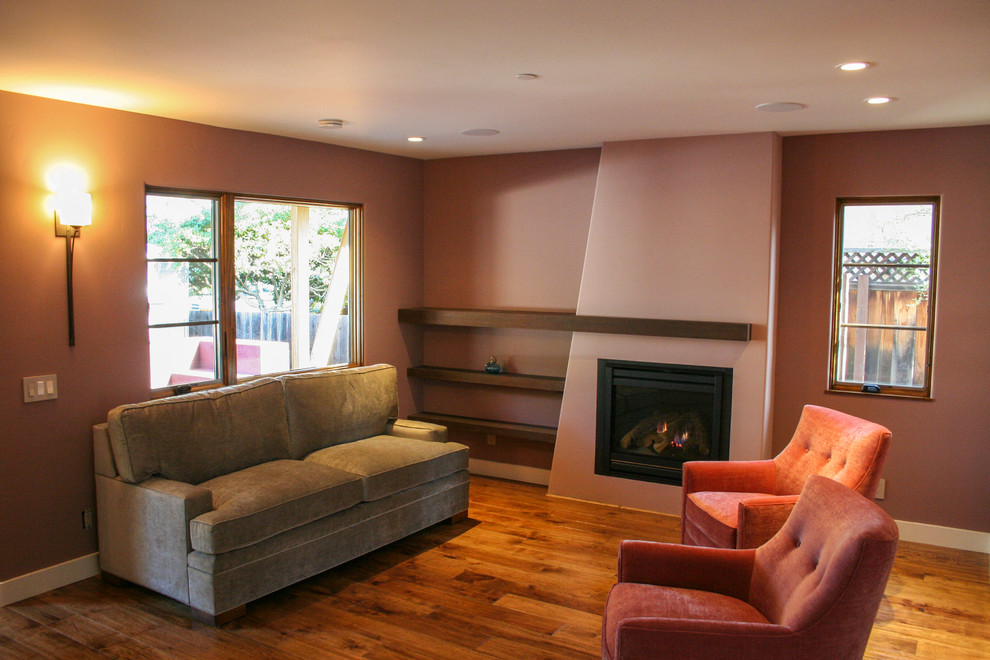 Foto di un soggiorno minimal di medie dimensioni con pavimento in legno massello medio