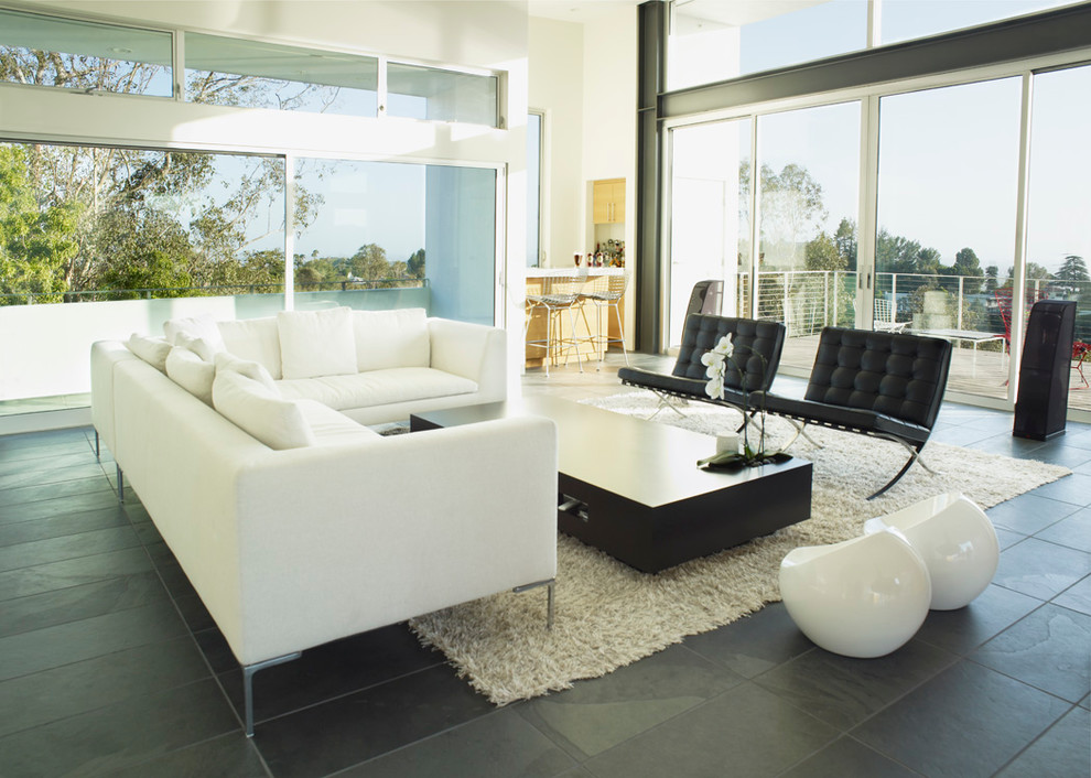 Inspiration for a modern open concept living room remodel in Los Angeles with a bar