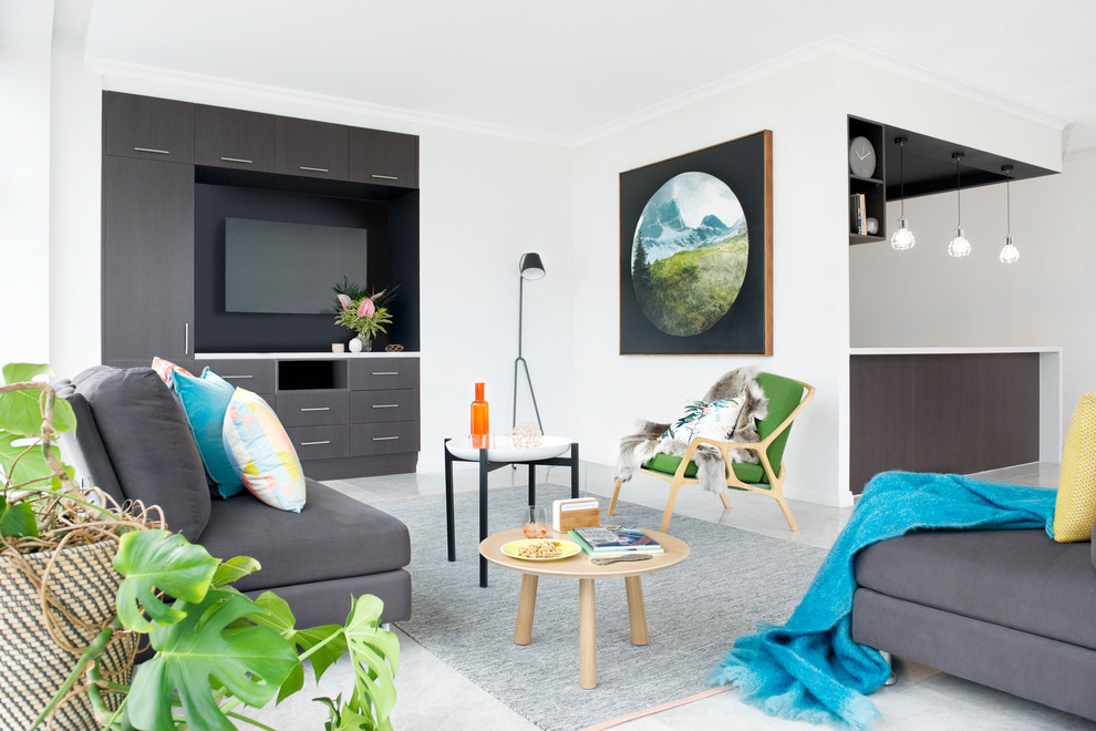Inspiration for a mid-sized contemporary open concept travertine floor living room remodel in Melbourne with white walls, no fireplace and a media wall