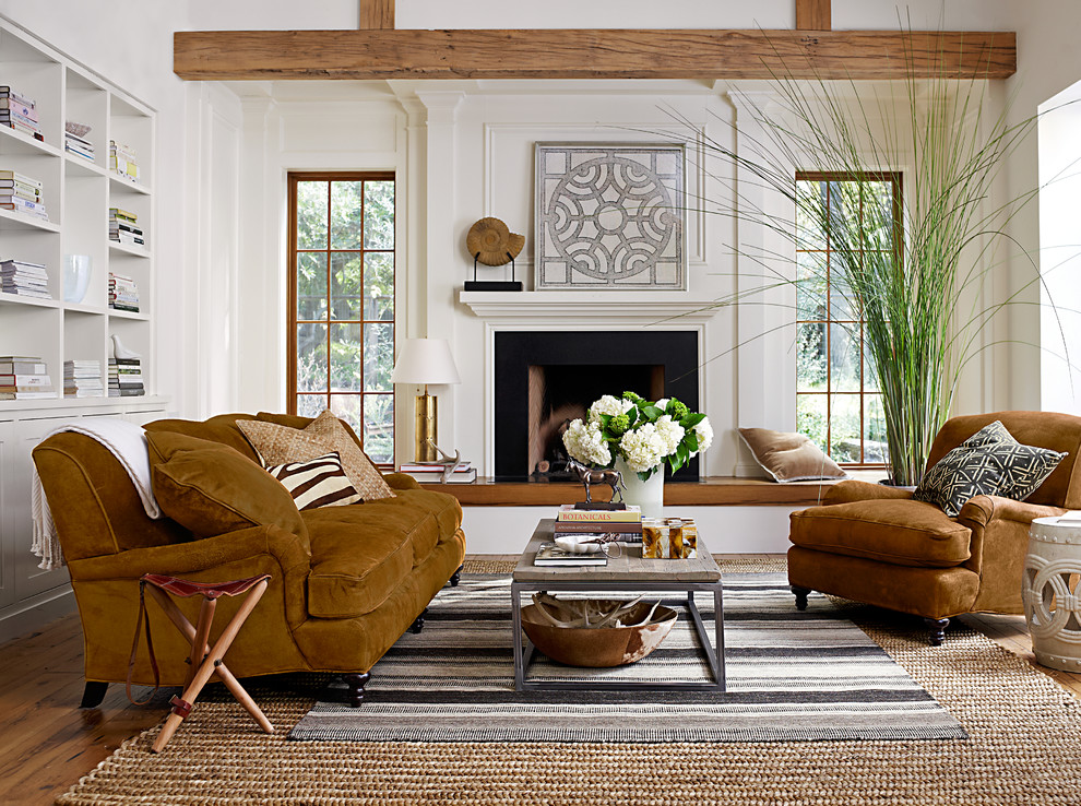 Идея дизайна: гостиная комната в современном стиле с коричневым диваном