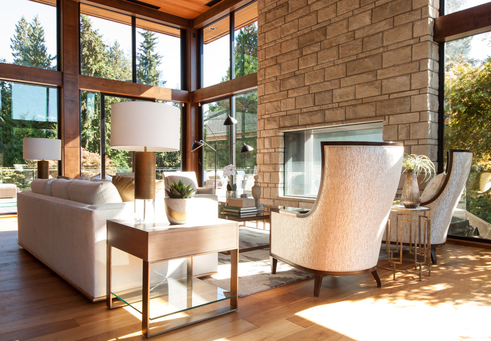 This is an example of an expansive contemporary open plan living room in Vancouver.