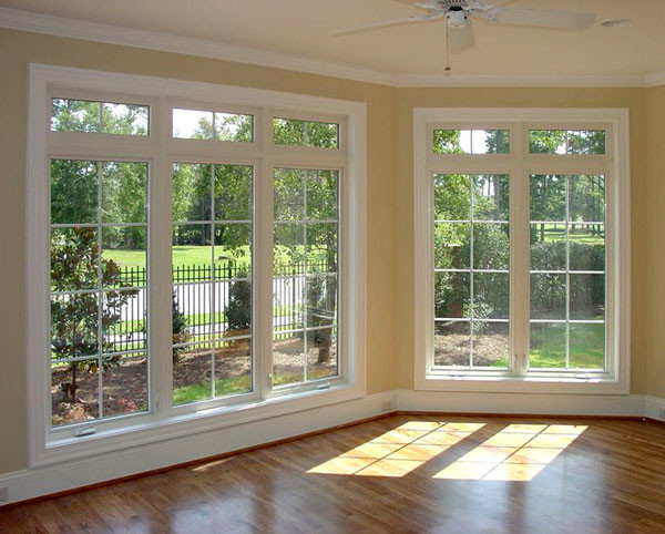 Medium sized classic enclosed living room in Philadelphia with beige walls and medium hardwood flooring.