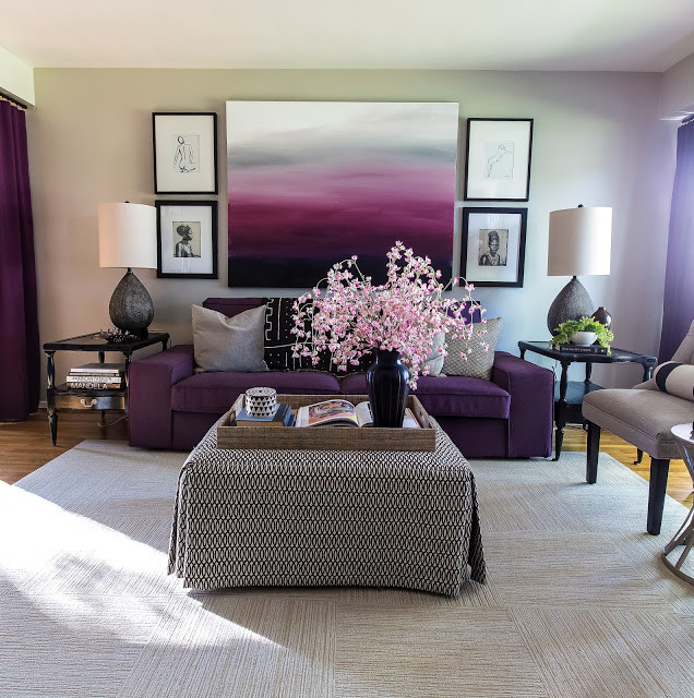 This is an example of a small eclectic grey and purple enclosed living room in Chicago with medium hardwood flooring, white walls and a freestanding tv.