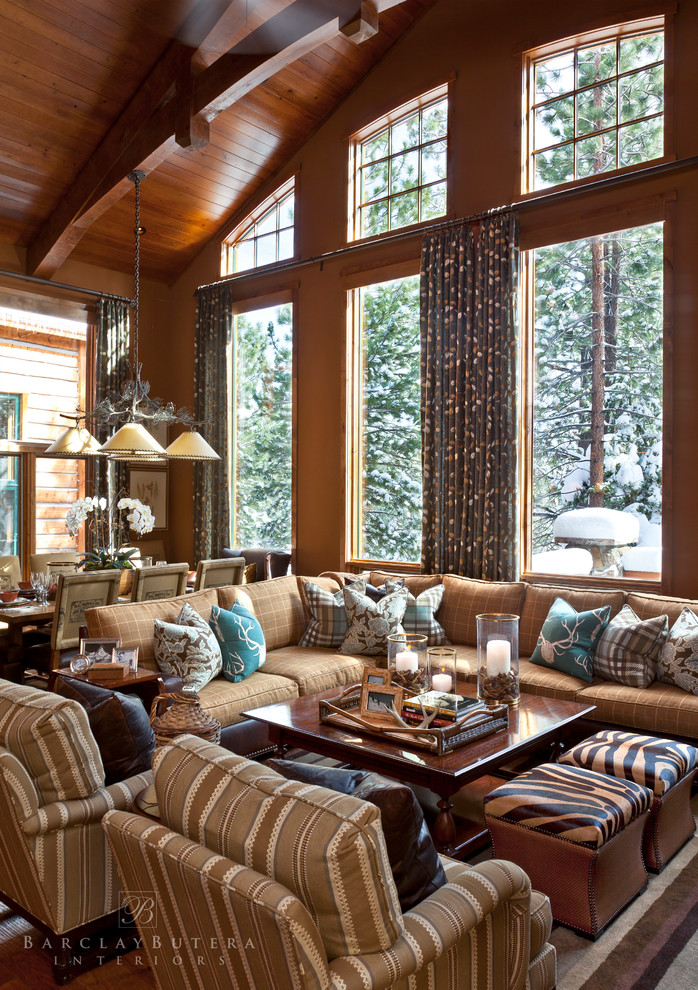 Rustic formal mezzanine living room in Orange County with brown walls and medium hardwood flooring.