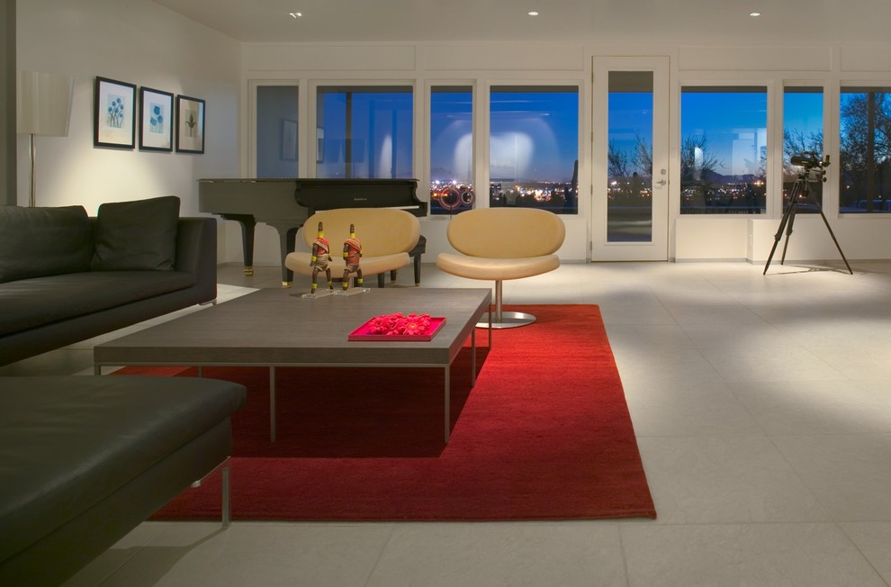 Photo of a modern living room in Phoenix with a music area, white walls and limestone flooring.