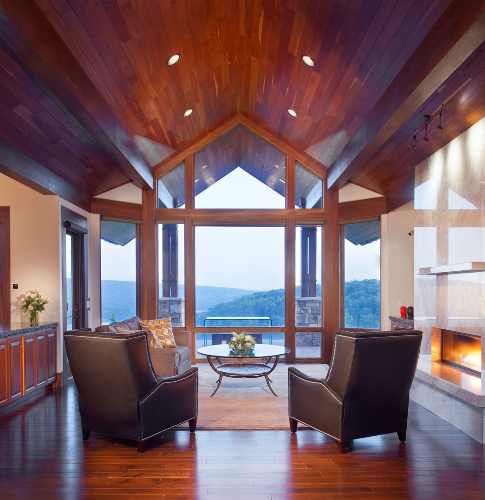 Идея дизайна: гостиная комната в современном стиле с горизонтальным камином без телевизора