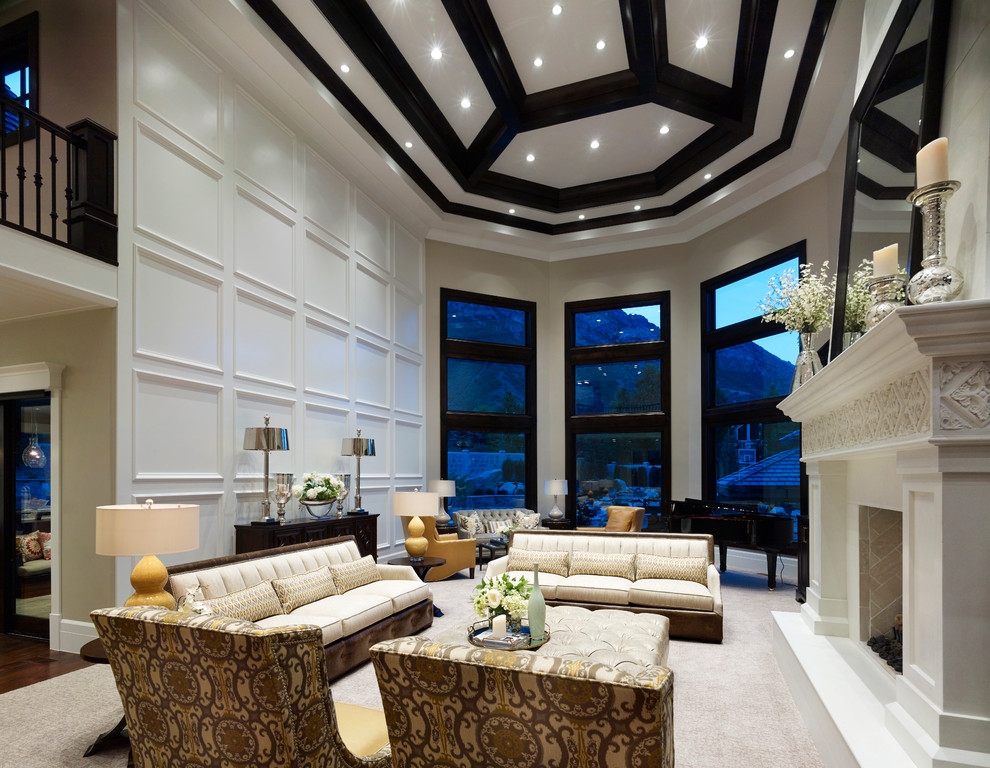 This is an example of an expansive traditional formal open plan living room in Salt Lake City with white walls, carpet, a ribbon fireplace, a plastered fireplace surround, no tv and grey floors.
