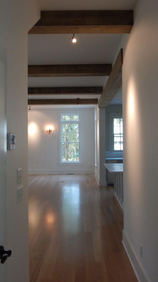 Wood beams in living room Farmhouse Living Room Miami by Aiken