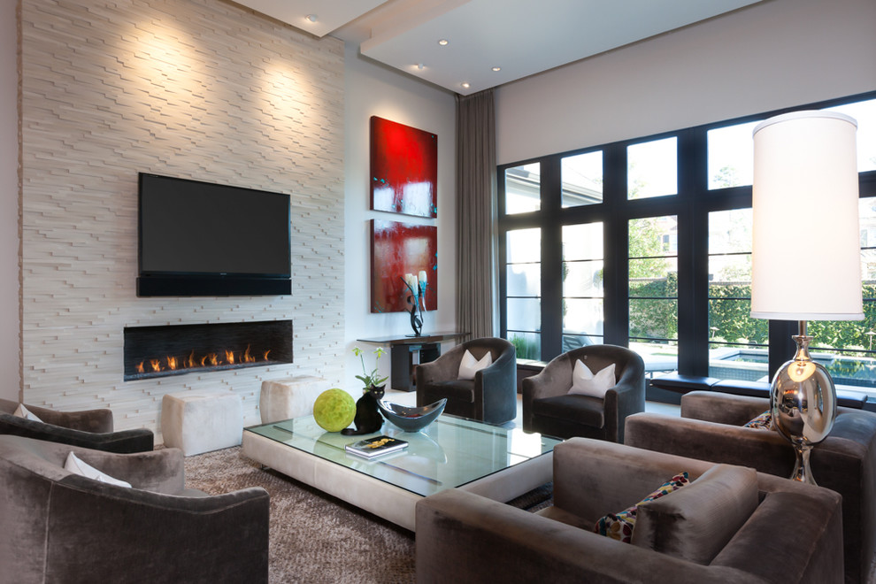Photo of a large modern formal open plan living room in Houston with white walls, carpet, a ribbon fireplace, a brick fireplace surround and a wall mounted tv.
