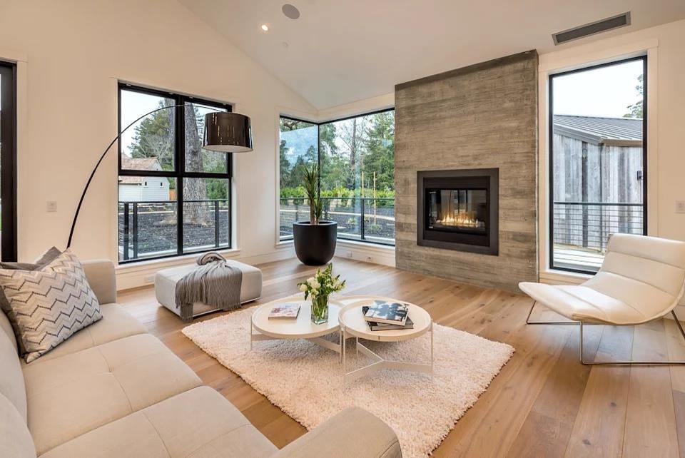Living room - large modern formal and open concept light wood floor and beige floor living room idea in San Francisco with white walls, a standard fireplace, a tile fireplace and no tv