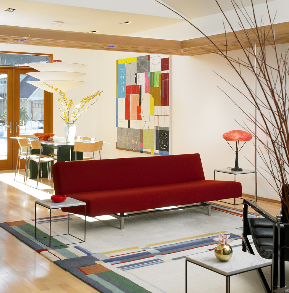Inspiration for a modern open concept living room remodel in Vancouver with beige walls