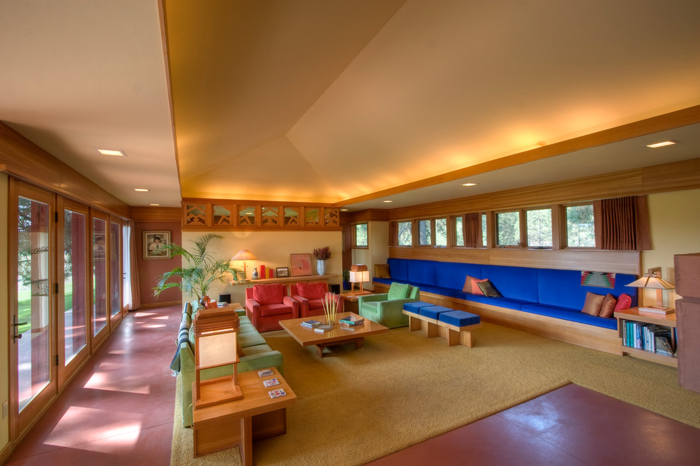 Example of a minimalist concrete floor living room design in Seattle