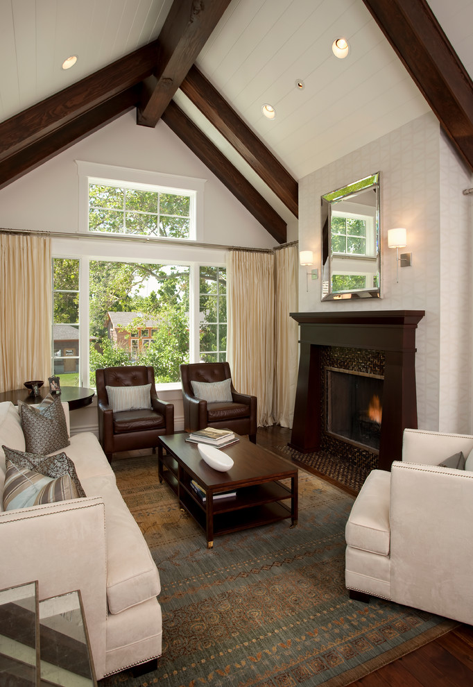 Medium sized traditional formal open plan living room in Salt Lake City with white walls, a standard fireplace, no tv, dark hardwood flooring and a tiled fireplace surround.