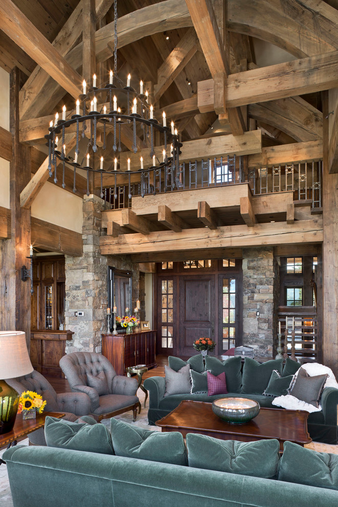 Example of a mountain style open concept living room design in Other