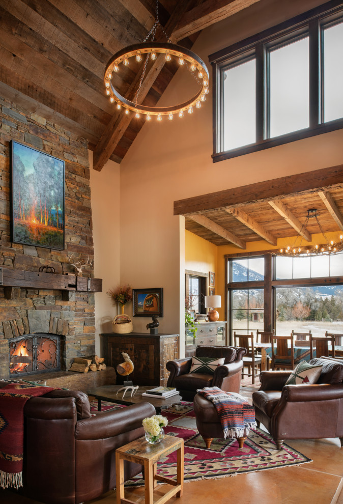 Inspiration for a huge rustic formal and open concept brown floor and wood ceiling living room remodel in Other with beige walls, a standard fireplace, a stone fireplace and no tv