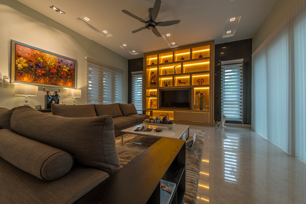 Immagine di un grande soggiorno moderno chiuso con pareti beige, pavimento in marmo e parete attrezzata