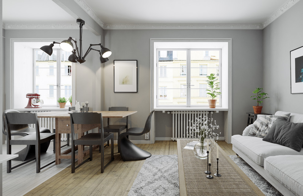 Inspiration for a scandi open plan dining room in Other with grey walls, medium hardwood flooring and brown floors.