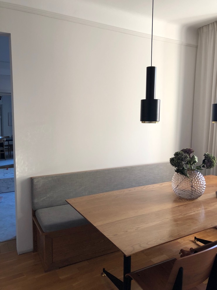 Example of a mid-sized trendy dining room design in Stockholm