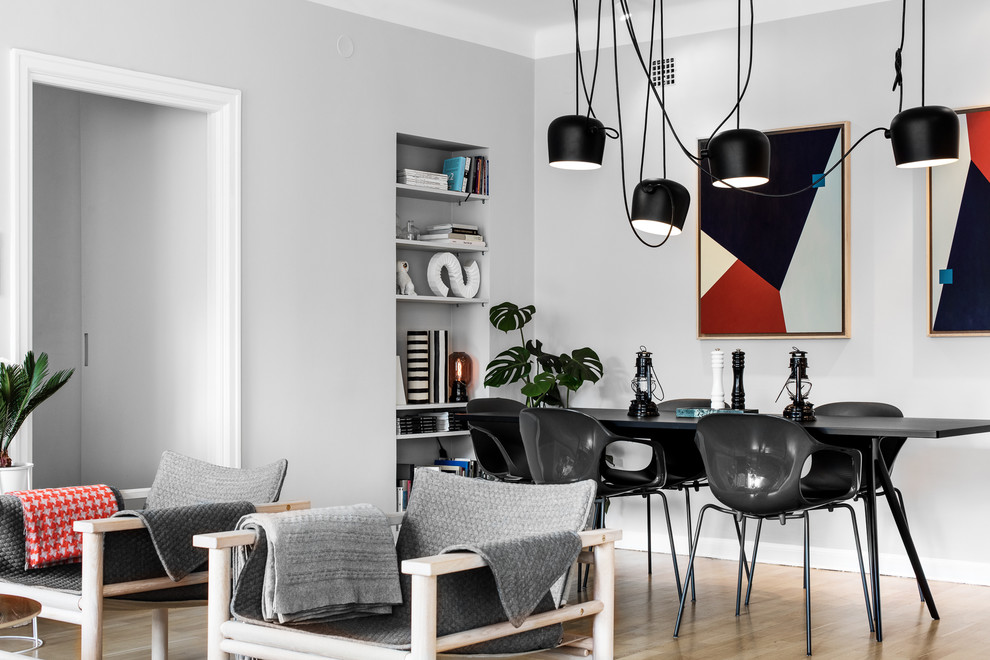 Design ideas for a medium sized scandi open plan dining room in Stockholm with white walls.