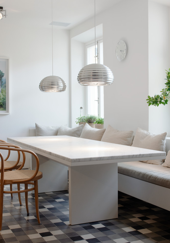 Example of a minimalist dining room design in Stockholm