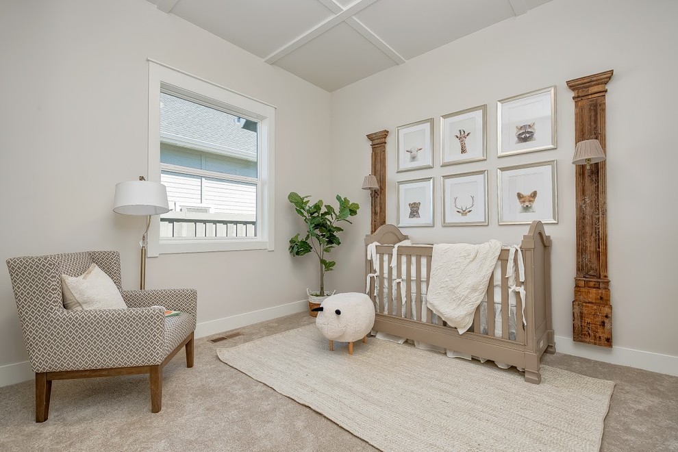 Идея дизайна: нейтральная комната для малыша среднего размера в современном стиле с бежевыми стенами, ковровым покрытием и бежевым полом