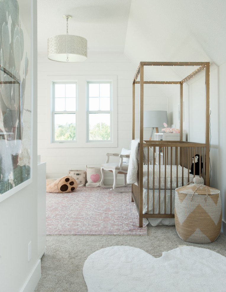 This is an example of a medium sized contemporary nursery for girls in Kansas City with white walls, beige floors, a vaulted ceiling and tongue and groove walls.