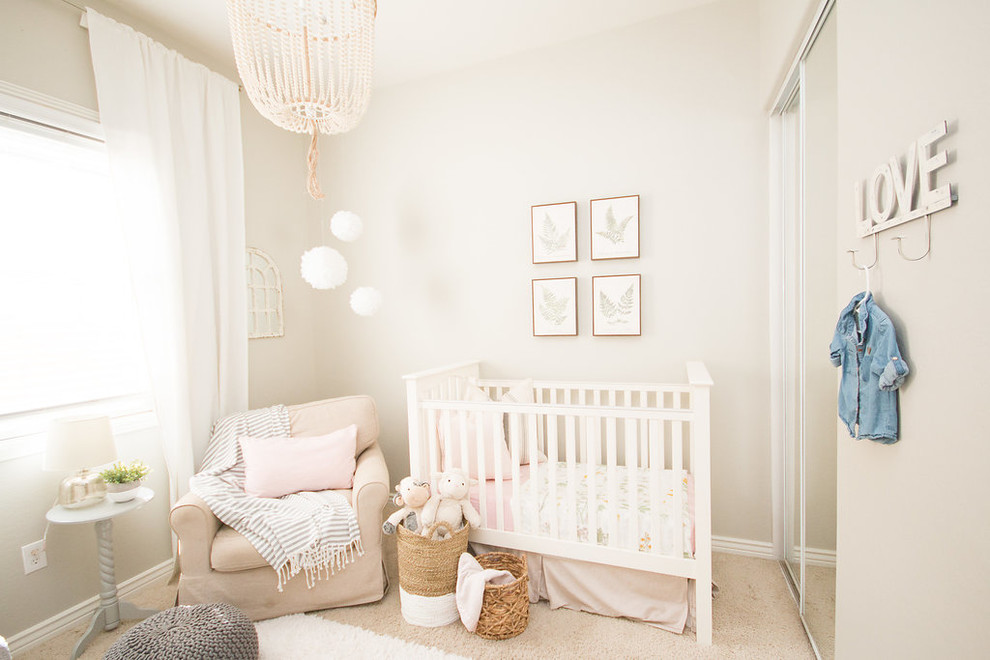Small classic nursery for girls in Phoenix with grey walls, carpet and beige floors.