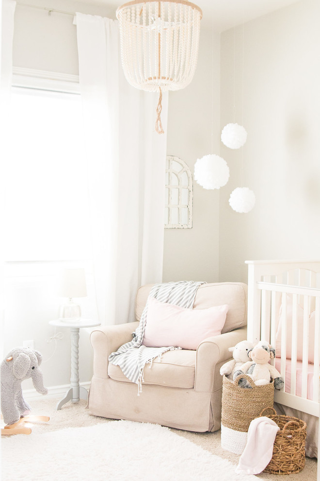 Photo of a small classic nursery for girls in Phoenix with grey walls, carpet and beige floors.