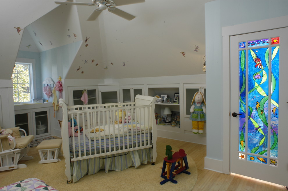 Bohemian gender neutral nursery in Other with blue walls.