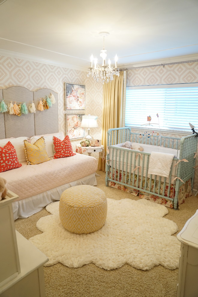 This is an example of a medium sized traditional nursery for girls in San Francisco with multi-coloured walls, carpet and beige floors.