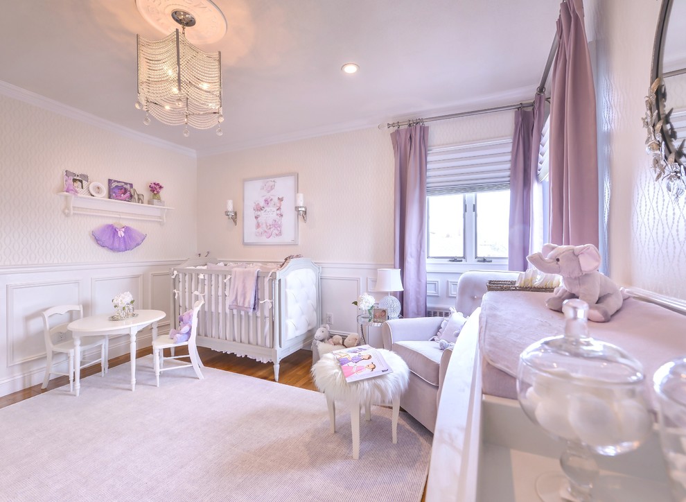Mid-sized transitional girl carpeted nursery photo in New York with white walls