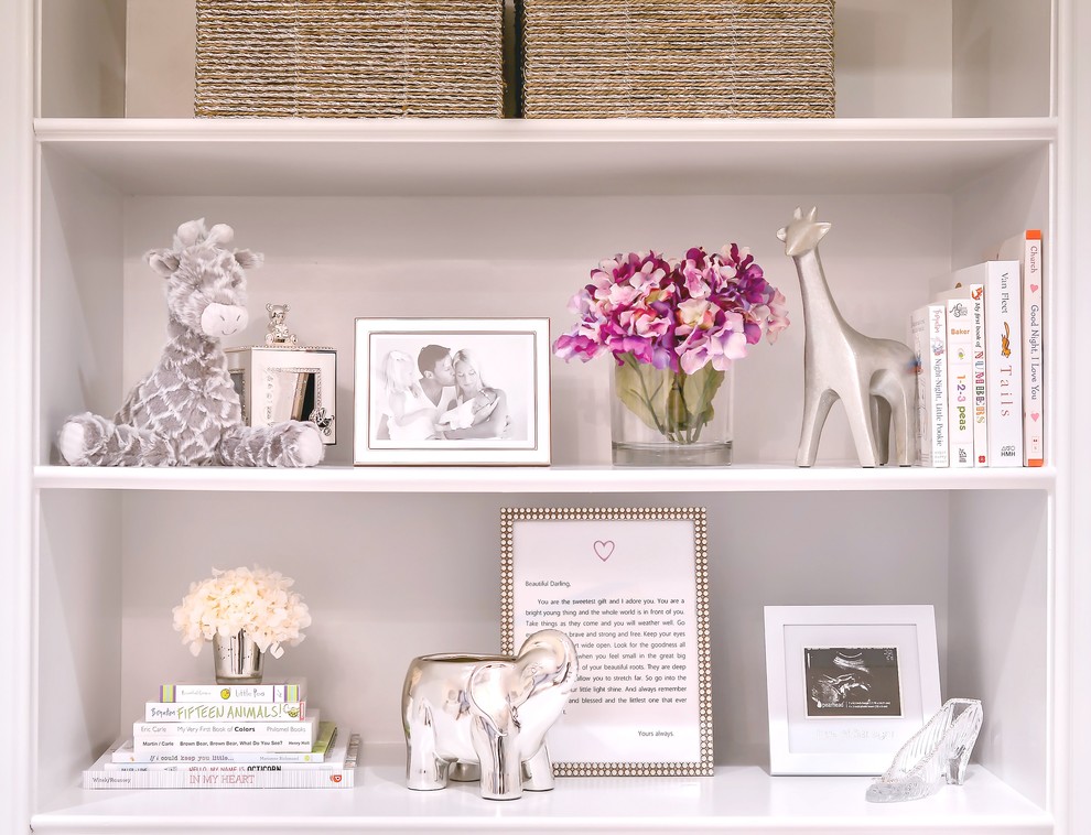 Nursery - mid-sized transitional girl carpeted nursery idea in New York with white walls