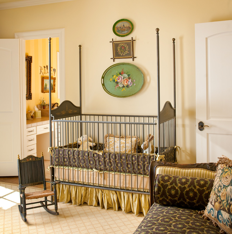 Inspiration for a medium sized classic nursery for girls in Dallas with yellow walls and medium hardwood flooring.