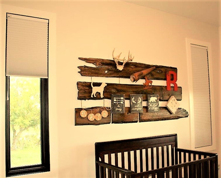 Inspiration for a rustic nursery in Edmonton.