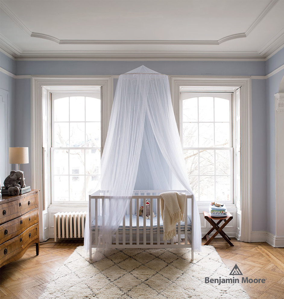 This is an example of a contemporary nursery in New York.