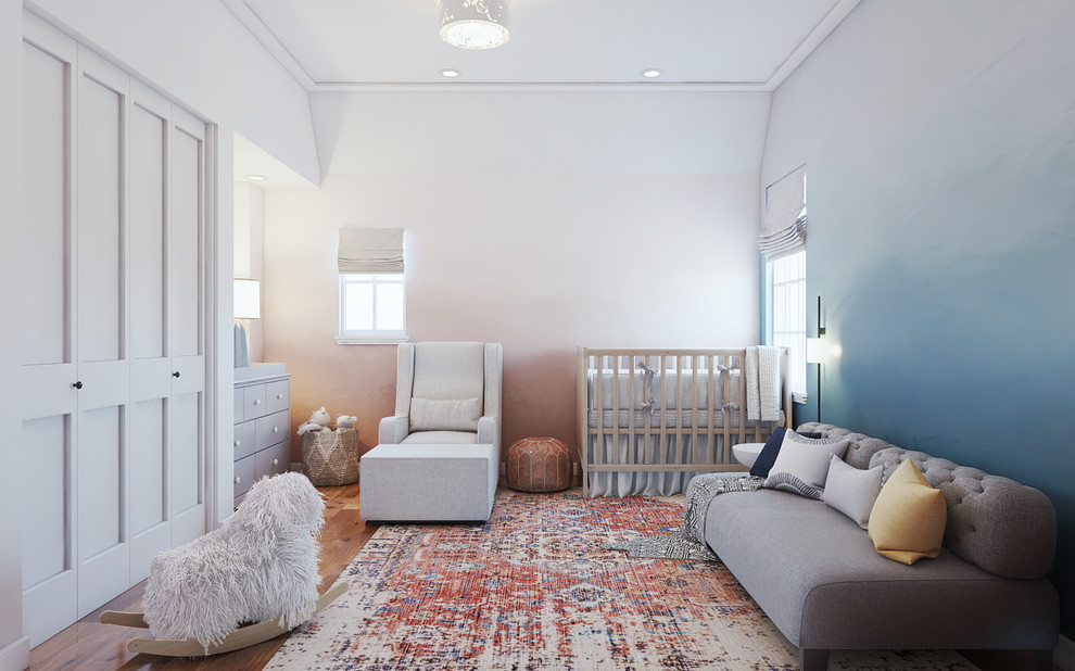 Small cottage chic gender-neutral medium tone wood floor and brown floor nursery photo in Denver with blue walls
