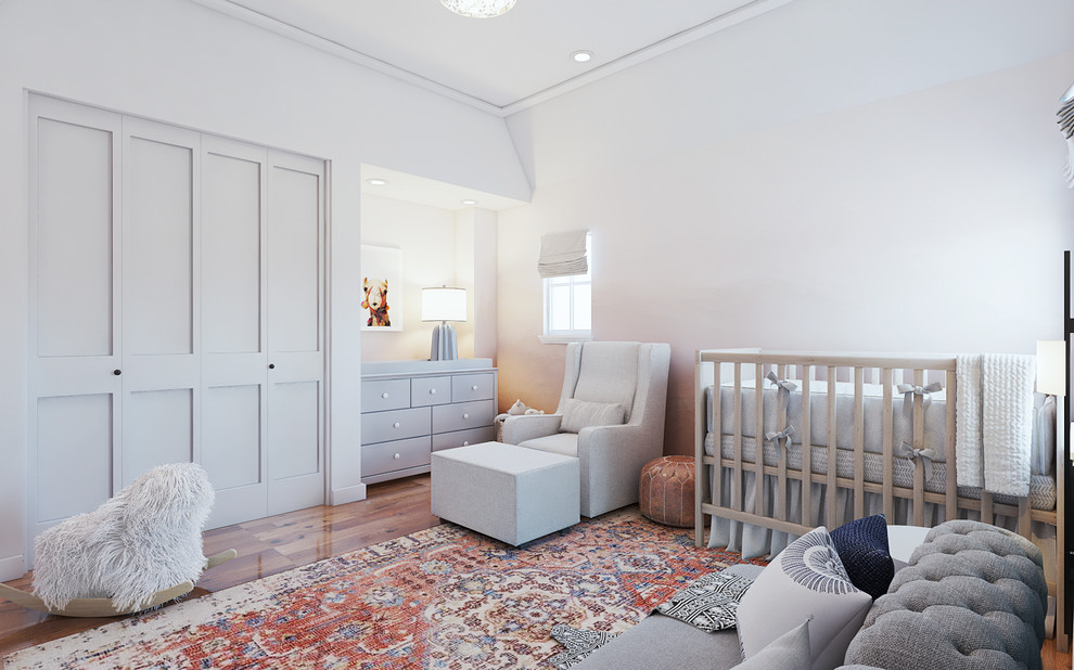 Esempio di una piccola cameretta per neonati neutra stile shabby con pareti blu, pavimento in legno massello medio e pavimento marrone