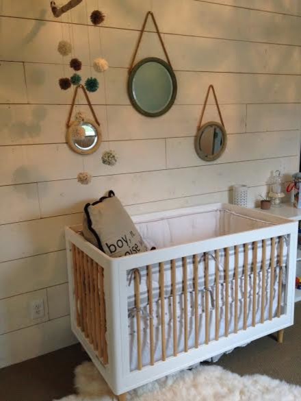 This is an example of a beach style nursery in Detroit.