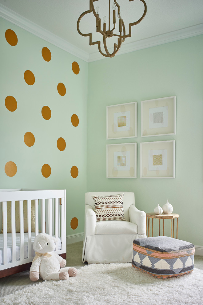 Example of a transitional gender-neutral carpeted nursery design in Orlando with green walls