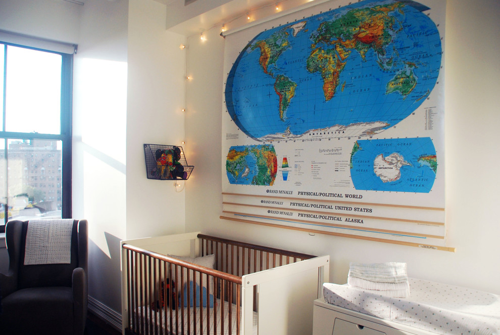 Inspiration for a medium sized eclectic nursery in New York with white walls and dark hardwood flooring.