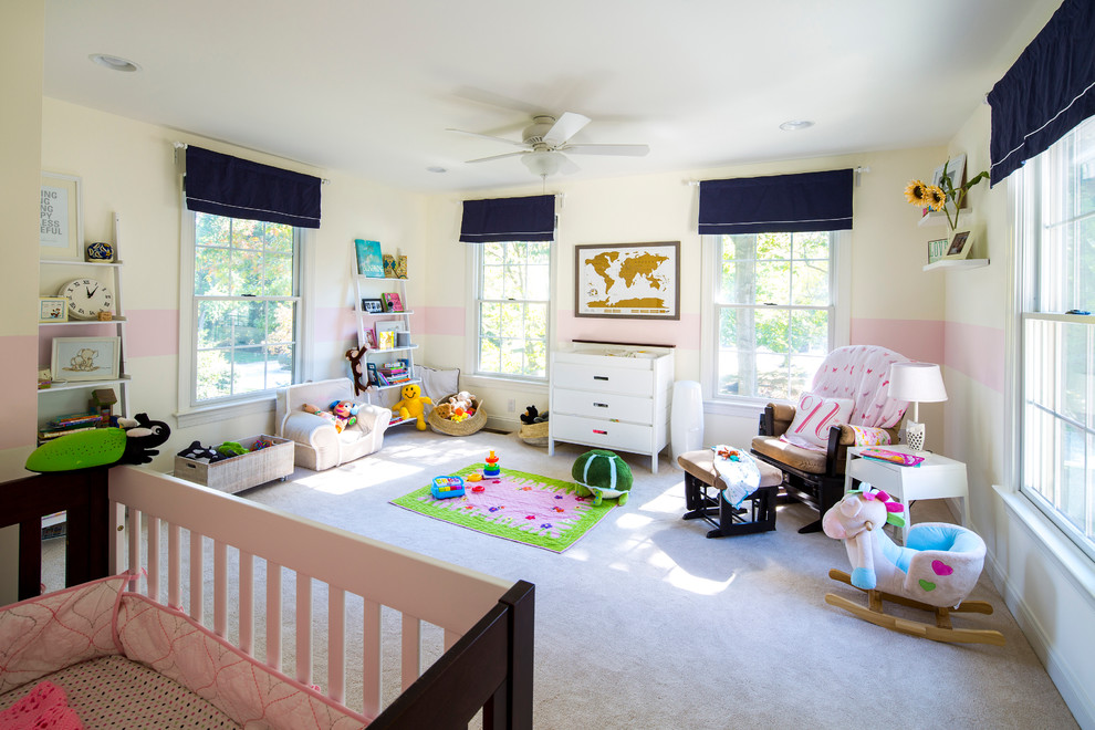 Inspiration for a medium sized traditional nursery for girls in San Francisco with beige walls, carpet and beige floors.