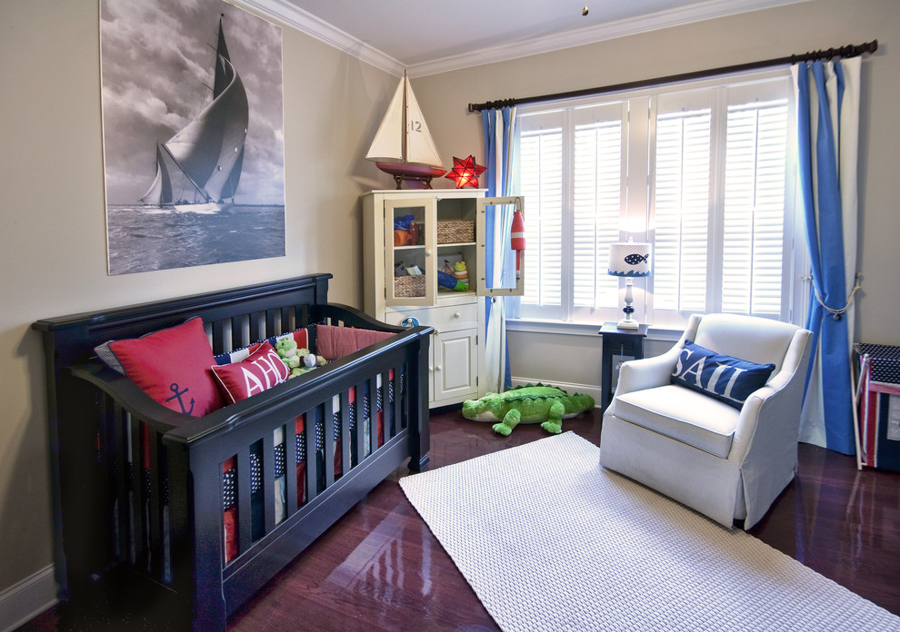 На фото: комната для малыша в морском стиле с бежевыми стенами и темным паркетным полом для мальчика с