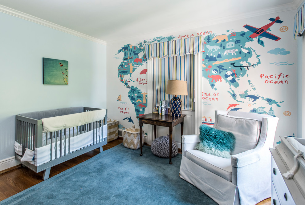 Example of a transitional gender-neutral medium tone wood floor and brown floor nursery design in Louisville with white walls
