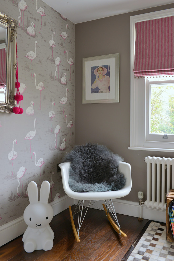 Inspiration for a mid-sized contemporary girl dark wood floor nursery remodel in Gloucestershire with brown walls