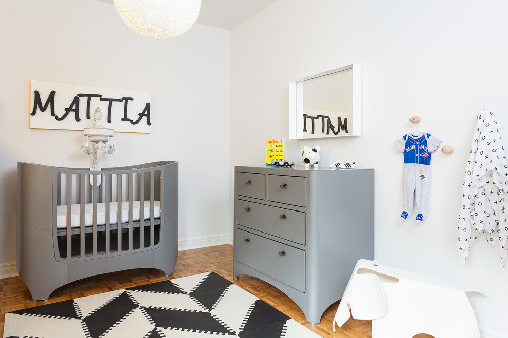 Medium sized contemporary nursery for boys in Toronto.