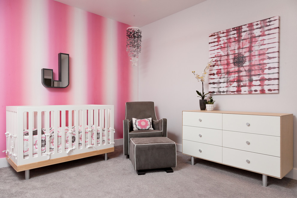 Design ideas for a contemporary nursery in Other with grey floors and a feature wall.