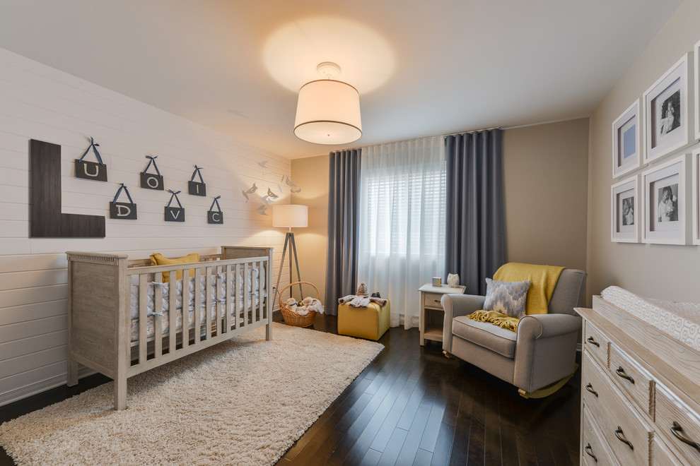 Design ideas for a medium sized classic gender neutral nursery in Montreal with multi-coloured walls, dark hardwood flooring, brown floors and a feature wall.