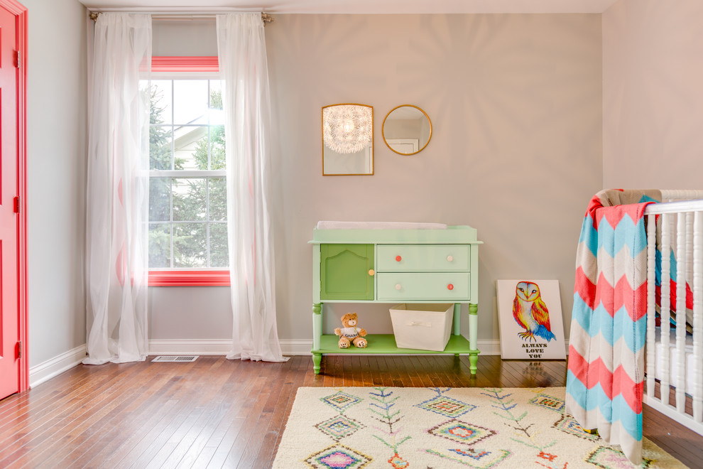 This is an example of a medium sized contemporary nursery in Columbus.