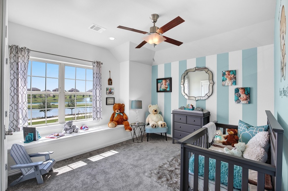 На фото: большая комната для малыша в современном стиле с синими стенами, ковровым покрытием и серым полом для мальчика с